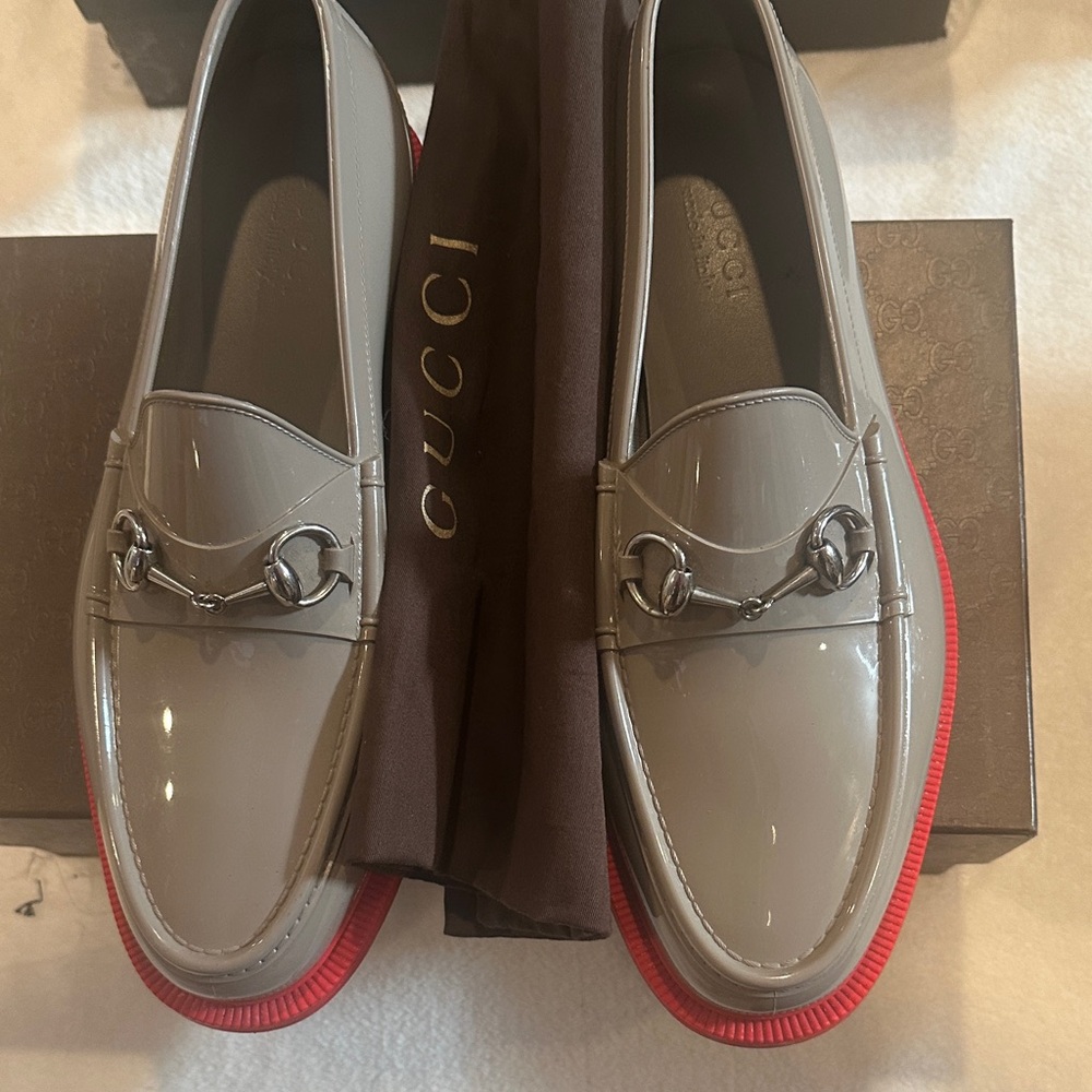 Gucci Men's Taupe Loafers with Vibrant Red Soles